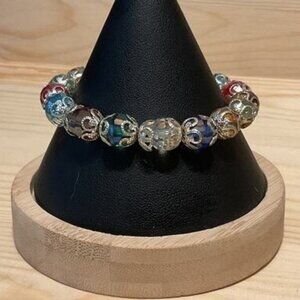 Colorful Handcrafted Glass Bead Bracelet With Intricate Silver Detailing